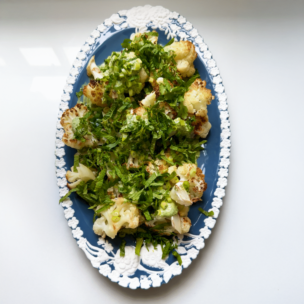 Crispy Roasted Cauliflower with Creamy Green Tahini Dressing