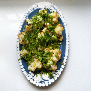 Crispy Roasted Cauliflower with Creamy Green Tahini Dressing